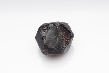 Natural stone garnet on white background