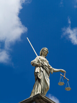 Scales of justice statue on the Dublin castle