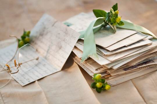 Flowers on pile of letters