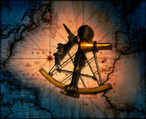 Historic sextant with old world map in background
