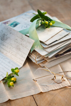 Flowers on pile of letters