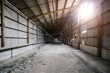 Old broken empty abandoned industrial building interior