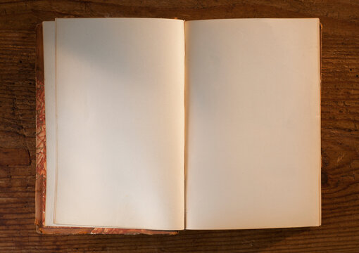 Close up of open book with white, empty pages