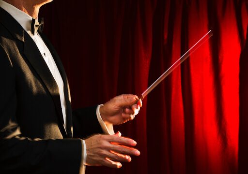 Midsection of orchestra conductor