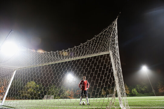 USA, California, Ladera Ranch, Football player preparing for penalty kick