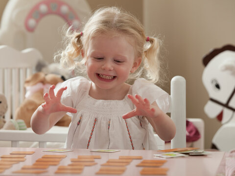 Young girl playing memory game