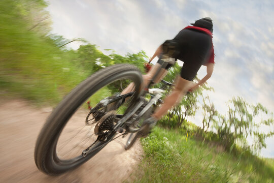 Cyclist on single track trail