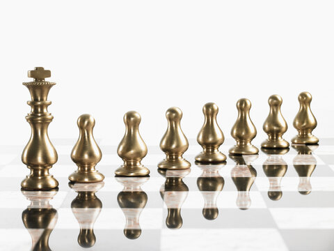 King with pawn chess pieces on board