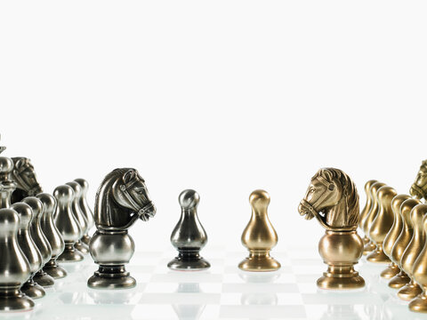 Silver and gold chess teams on board