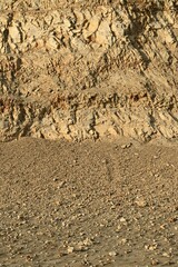Rocks at the bottom of a cliff