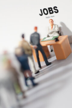Figurines applying for jobs