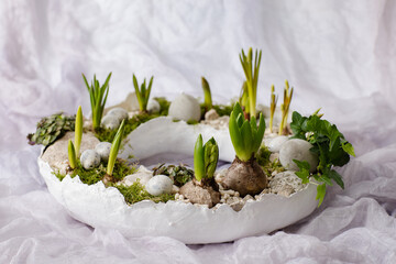 easter decoration for the table with flowers and eggs
