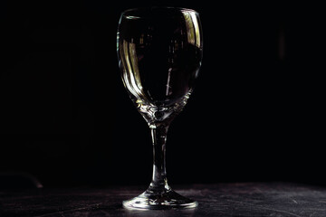 crystal goblet with black background and side light