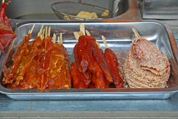 China, Nanjing special pig meet at the Fuzimiao market. - 421658204
