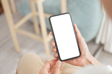 cell phone blank white screen mockup.woman hand holding texting using mobile on desk at office.background empty space for advertise.work people contact marketing business,technology