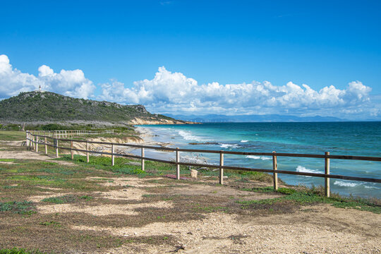 A view of the uninhabited Isla de Caja de Muertos from the windy Caribbean Sea side.  The island is a popular day trip destination out of Ponce, Puerto Rico.  Copy space. 
Ponce in Puerto Rico, USA.