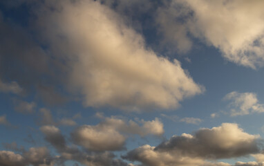 Beautiful white clouds on the blue sky. Resource for designers.