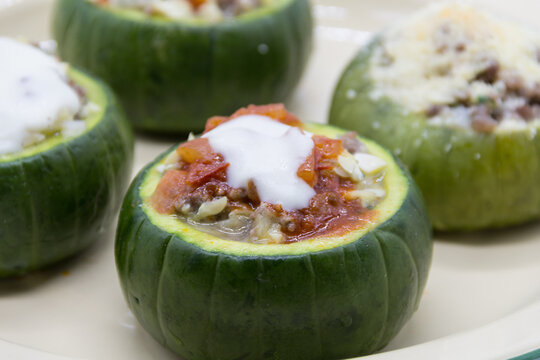 zucchini stuffed with meat and a variety of sauces