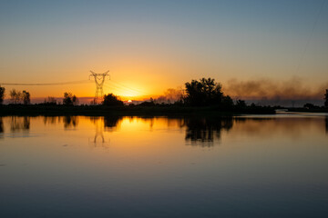 beautiful postcard of a sunset in a river in Argentina