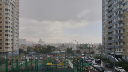 cityscape beautiful rainy day wet yard and cars