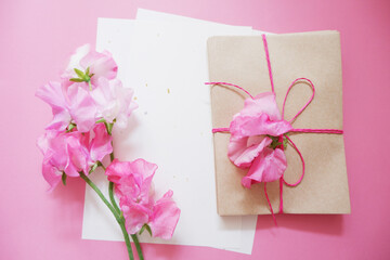 Spring concept. Pink sweet peas with letter set. Spring greeting, mother's day, bridal and event design. スイートピーの花と手紙セット、母の日ギフト、ブラダイルイベント、春のイベント