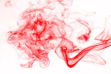 Movement of smoke, abstract red smoke on white background, ink water