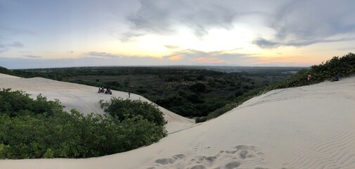 panorama of sunset between the dunes