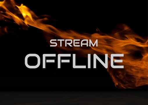 Digitally generated image of this stream offline text against fire on black background