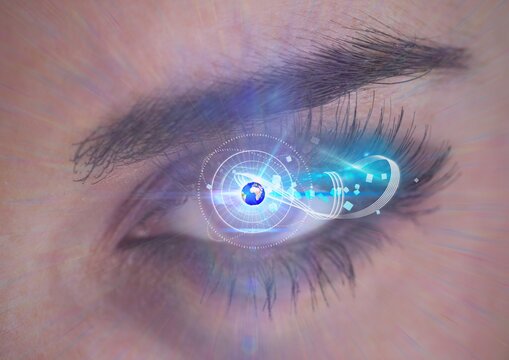 Digital composite image of round scanner and globe against close up of female human eye