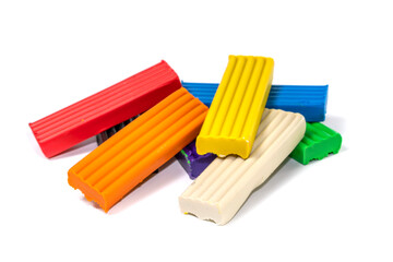 Composition of colored plasticine on isolated white background. colorful molding dough. polymer clay