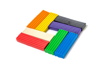 Fototapeta premium Composition of colored plasticine on isolated white background. colorful molding dough. polymer clay