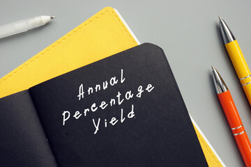 Business concept about Annual Percentage Yield with sign on the piece of paper.
