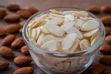 Almond slices in glass bowl.