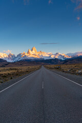 Road to Fitz Roy Mountain in the morning with orange sunlight cover the peak of Fitz Roy, Autumn, Patagonia, Argentina.