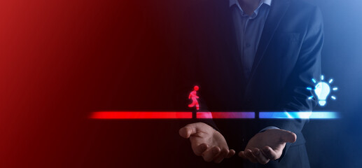 Male business man hand hold a connecting block between two sets of bridge road for a silhouetted...