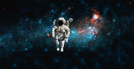 Astronaut spaceman do spacewalk while working for space station in outer space . Astronaut wear full spacesuit for space operation . Elements of this image furnished by NASA space astronaut photos.