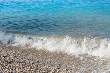Sea waves on the pebble beach