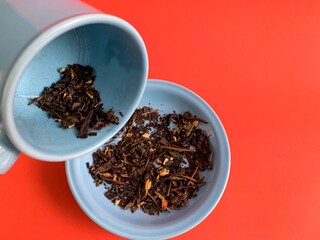 dried tea leaves in a tea cup.