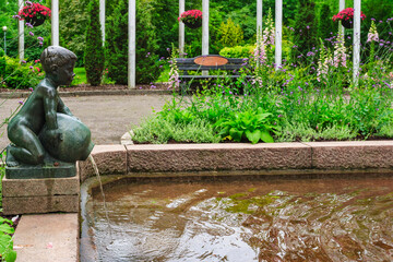 Garden pond with a statue