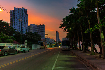 Fototapeta na wymiar PATTAYA, THAILAND - January 19, 2019 :Sunset on a deserted Jomtiensaineung street in Pattaya,Thailand