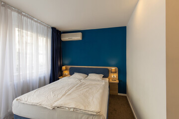 Fototapeta na wymiar Bedroom interior with master bed
