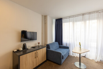 Interior of a hotel apartment, table, work area