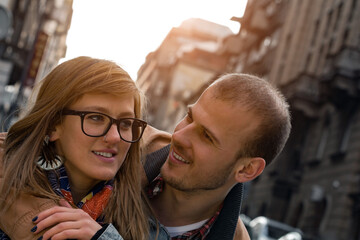 Young couple enjoying on the urban streets.
