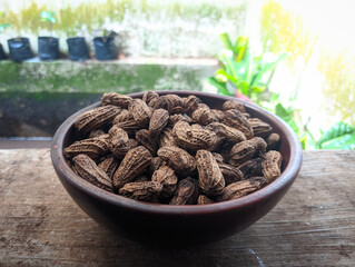 Boiled peanuts in a bowl container