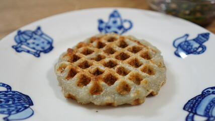 potato waffle grilled in waffle pan