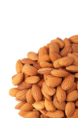 Peeled almonds group. Close-up. White background. View from above. Isolated. Place for your text.