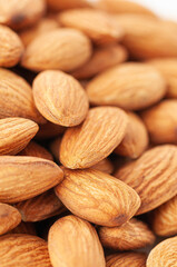 Peeled almonds group. Close-up. Macro.