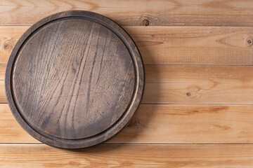 Meat or bread pizza cutting board for homemade baking on table. Wooden pizza board