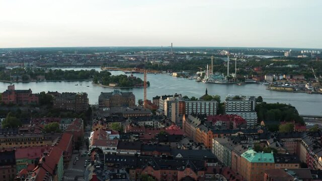 Stockholm, Sweden. Panoramic aerial flying drone view of S&ouml;dermalm, Djurg&aring;rden, amusement park Gr&ouml;na Lund, water with boats and islands, the city, and archipelago.