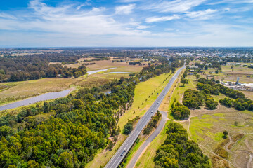 A440 Highway towards Sale town in Victoria Australia - aerial landscape - 421731258
